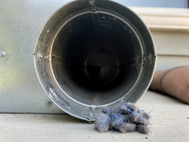 Port Wentworth Dryer Vent Cleaning technician using specialized equipment to clear severe dryer vent blockage in Port Wentworth